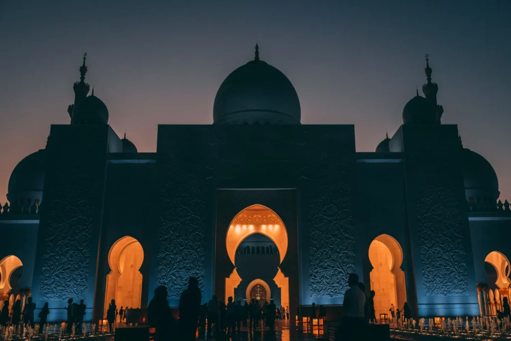 Place of worship lit up at dusk