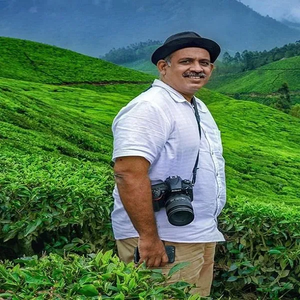 One of our chauffeur-guides in the Munnar estates